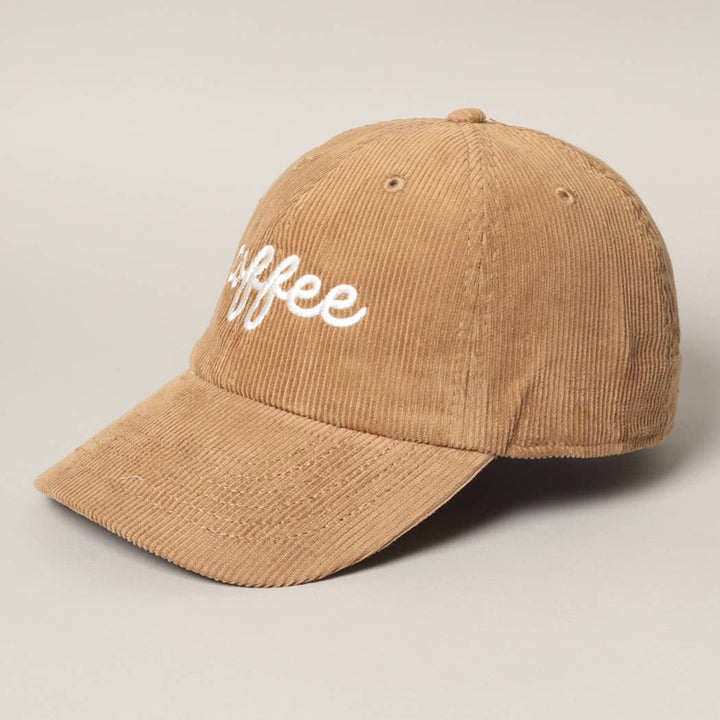Tan corduroy cap in three-quarter view showing the &